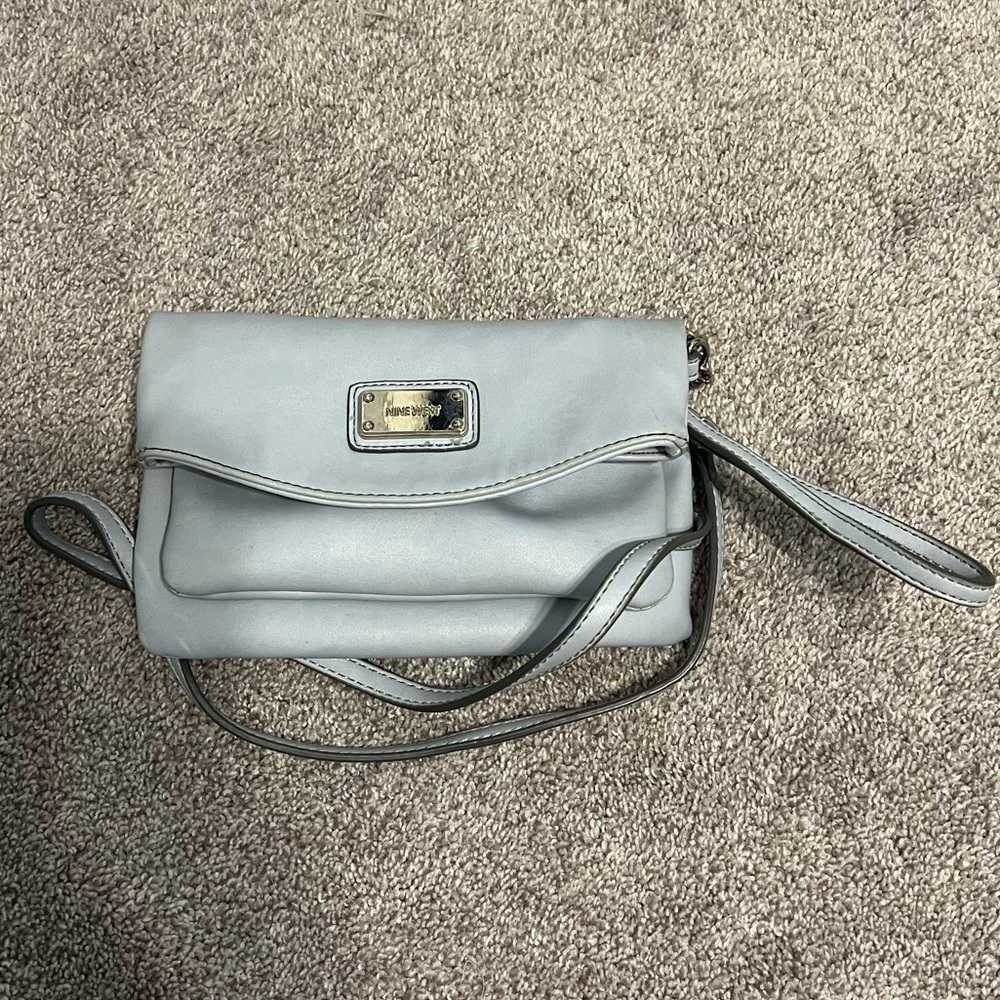 Light blue Nine West cross body with many pockets